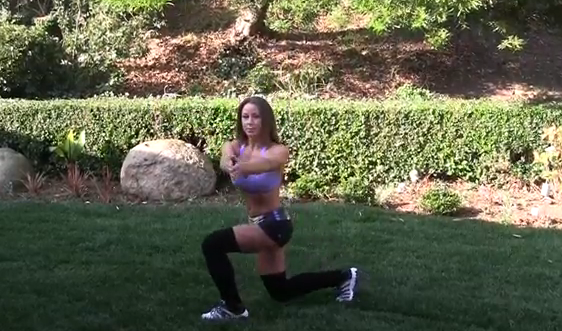 Personal Trainer, Lauren Kern, demonstrates how to do a split squat with rotation